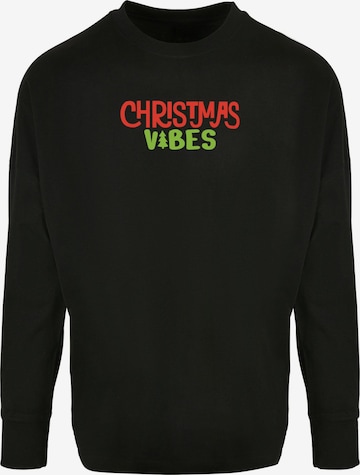 T-Shirt 'Christmas Vibes' Merchcode en noir : devant