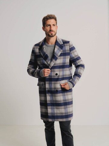 ABOUT YOU x Kevin Trapp Between-Seasons Coat 'Gino' in Blue: front