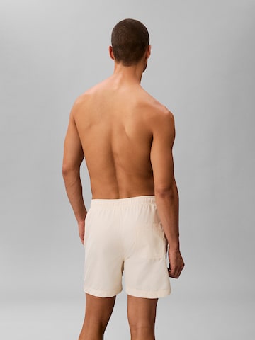 Shorts de bain Calvin Klein Swimwear en beige
