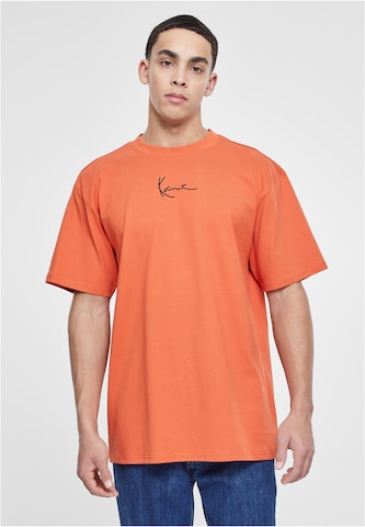 T-Shirt Karl Kani en orange : devant