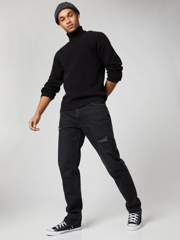 Kosta Williams x About You Regular Jeans in Schwarz