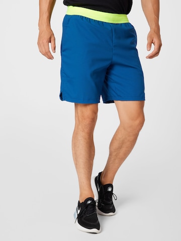 Regular Pantalon de sport NIKE en bleu : devant