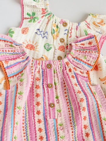 Ensemble Next en mélange de couleurs