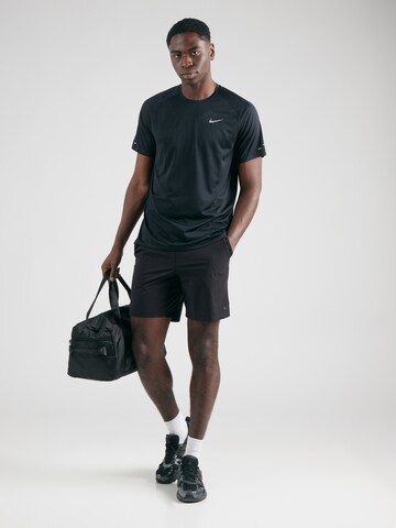 NIKE Функциональная футболка 'ADV STRIDE' в Черный