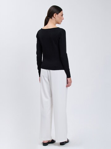 Influencer Pullover in Schwarz