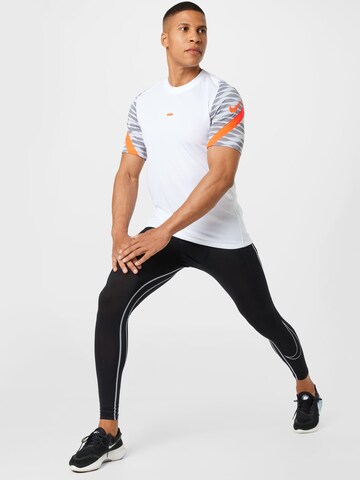 NIKE Skinny Sportbroek in Zwart