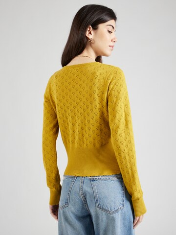 Cardigan King Louie en jaune