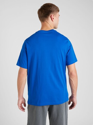 Reebok - Camiseta 'IDENTITY' en azul