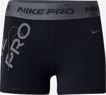 Skinny Pantalon de sport NIKE en noir : devant