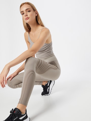 Skinny Pantaloni sportivi 'Les Mills' di Reebok in grigio