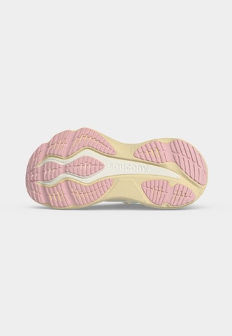 Chaussure de course saucony en beige