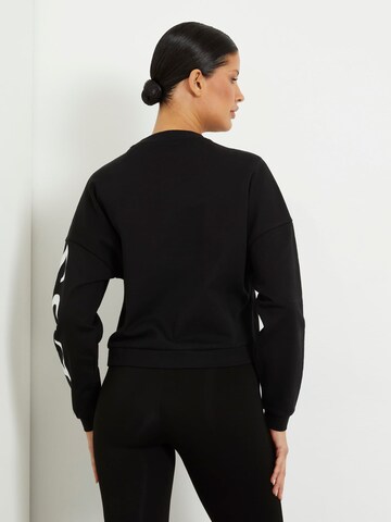 GUESS Sweatshirt in Schwarz
