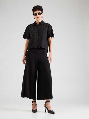 Wide leg Pantaloni 'Pia Milano' di King Louie in nero
