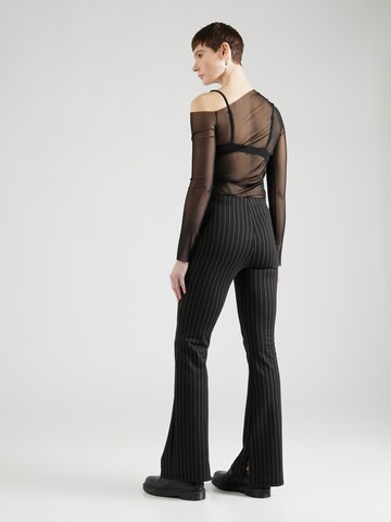 Trendyol Flared Trousers in Black