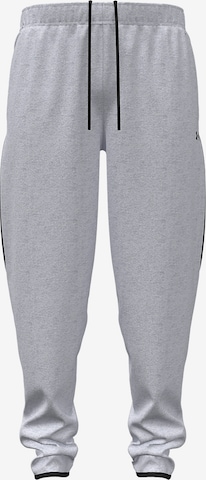 UNDER ARMOUR Tapered Sportbroek 'Unstoppable' in Grijs: voorkant