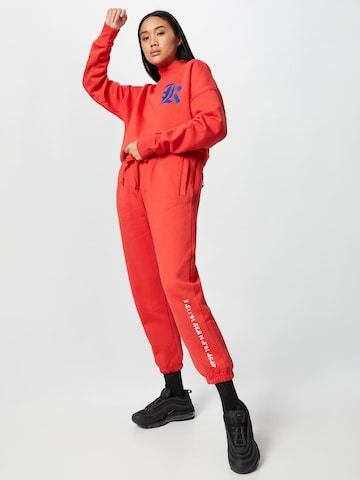 ABOUT YOU x Mero Loose fit Pants 'Code' in Red