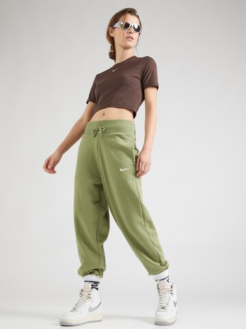 Nike Sportswear Zwężany krój Spodnie 'PHNX FLC' w kolorze zielony