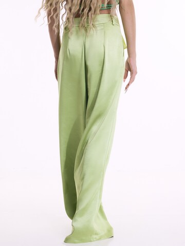 ABOUT YOU x Emili Sindlev Wide leg Pleat-front trousers 'Elva' in Green