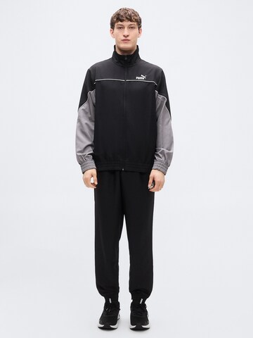 PUMA Trainingspak in Zwart: voorkant