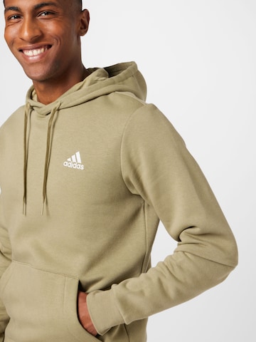 ADIDAS SPORTSWEAR Αθλητική μπλούζα φούτερ 'Essentials Fleece' σε πράσινο