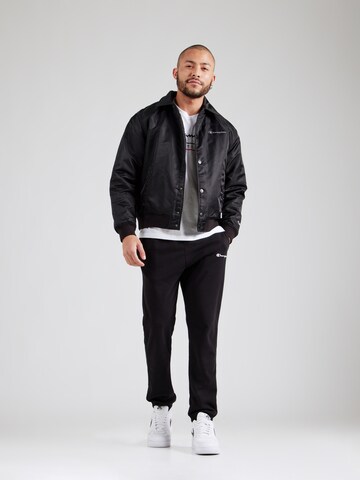 Champion Authentic Athletic Apparel - Tapered Pantalón en negro