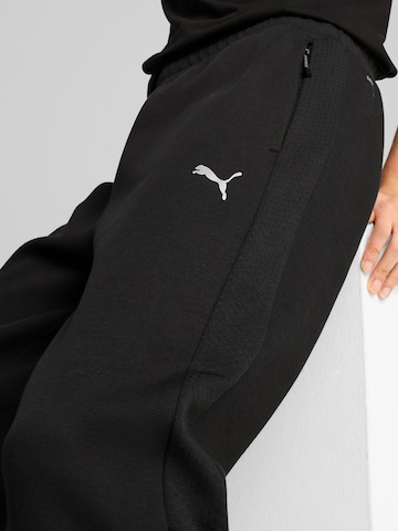 PUMA Slimfit Παντελόνι φόρμας 'Evostripe' σε μαύρο