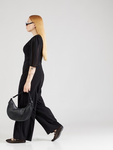 WAL G. - Jumpsuit 'MELANY' en negro