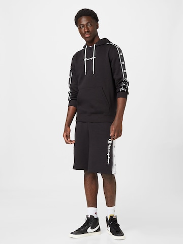 Champion Authentic Athletic ApparelLoosefit Hlače - crna boja