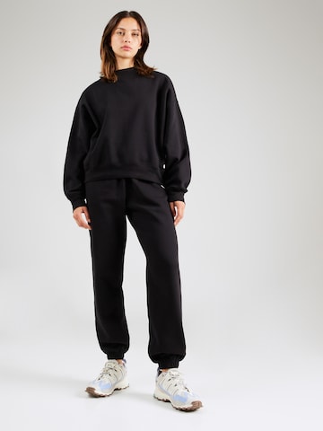 BJÖRN BORG Tapered Sportbroek in Zwart