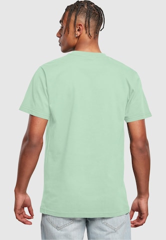 Merchcode Shirt 'Peanuts - It's Good To Have A Friend' in Green