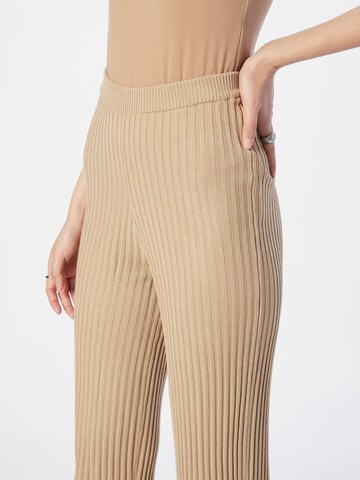 Urban Classics Flared Leggings i beige