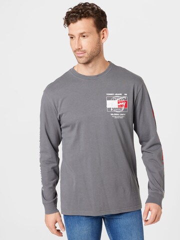 T-Shirt 'Globe' Tommy Jeans en gris : devant