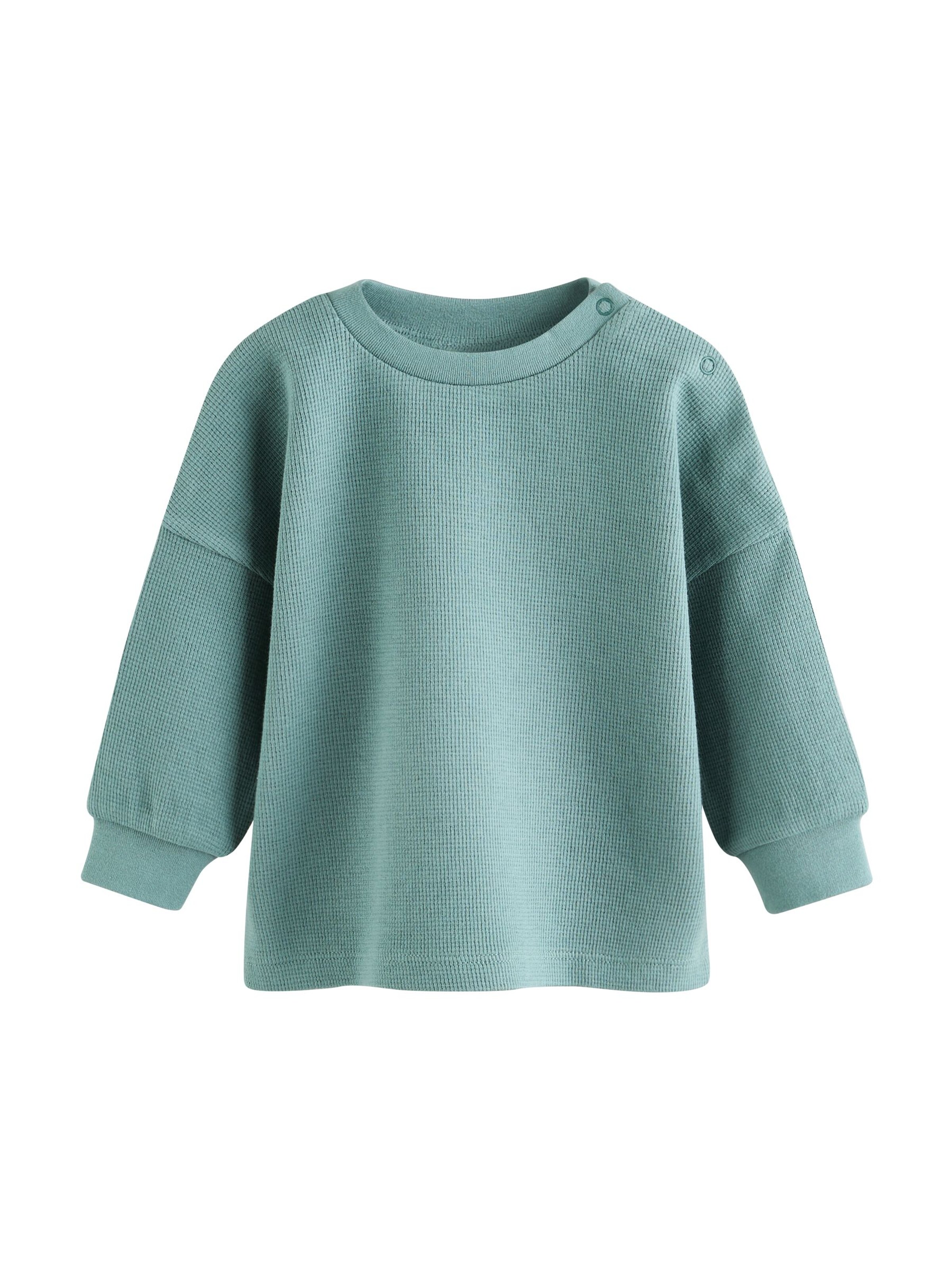 Set de la Next pe verde