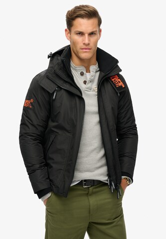 Veste mi-saison Superdry en noir : devant
