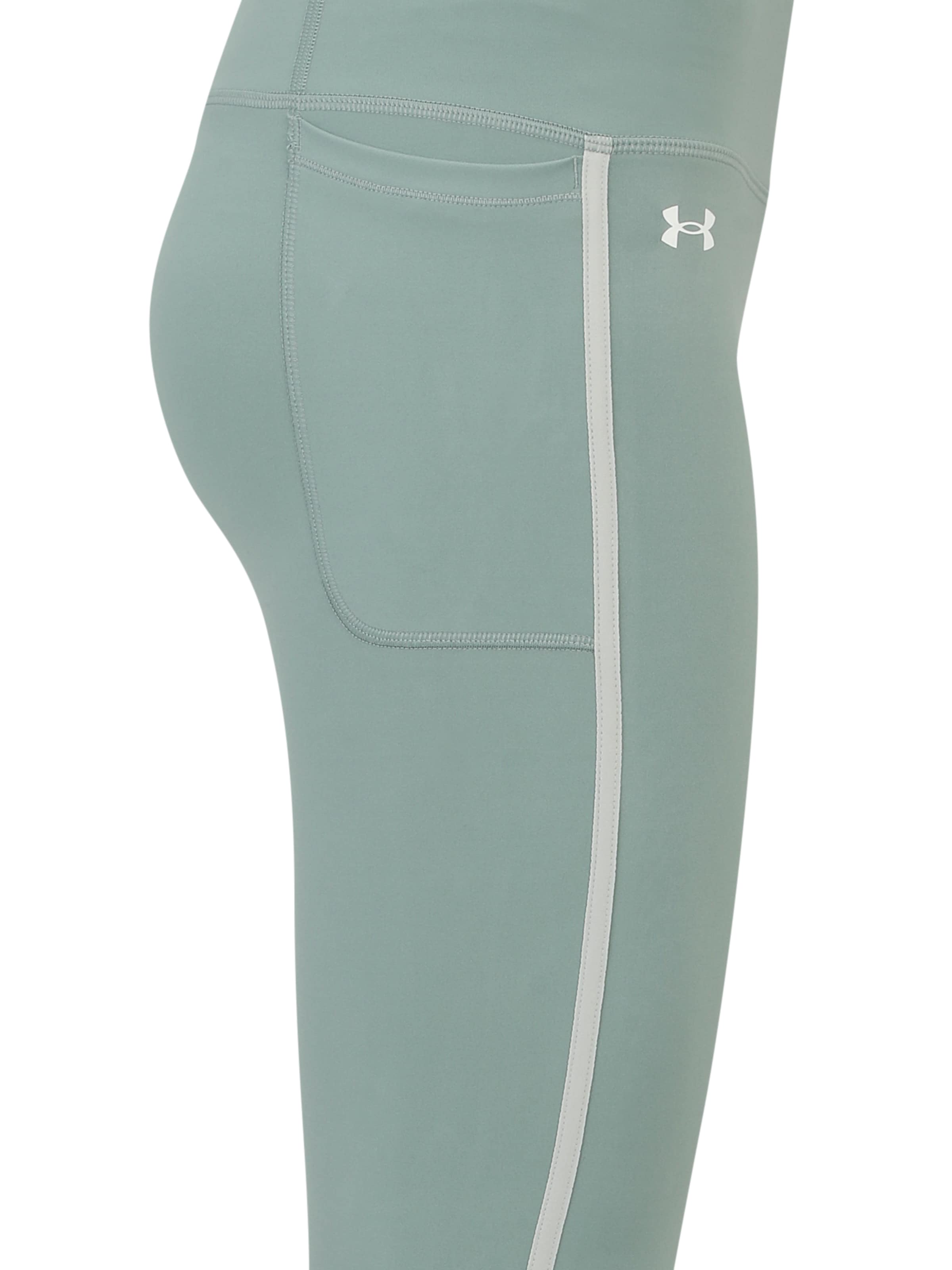 Skinny Pantalon de sport 'Motion' UNDER ARMOUR en vert