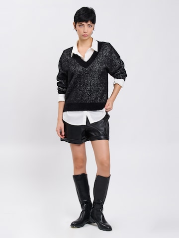 Influencer Pullover in Schwarz