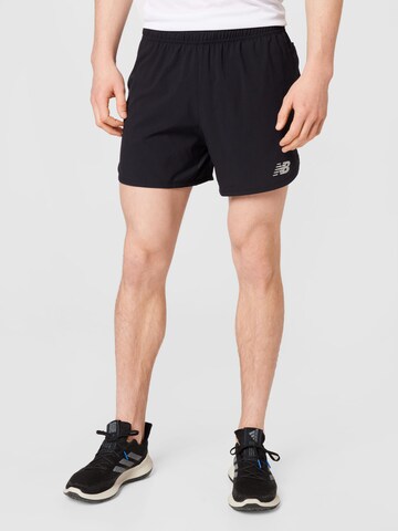 Regular Pantalon de sport 'Impact Run' new balance en noir : devant