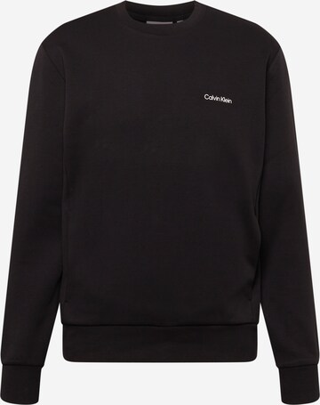 Sweat-shirt Calvin Klein en noir : devant