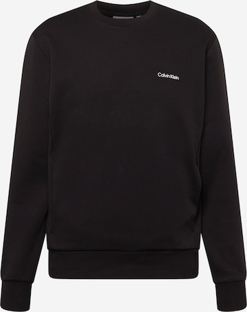 Sweat-shirt Calvin Klein en noir : devant