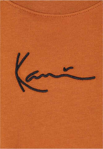 Karl Kani T-Shirt in Braun
