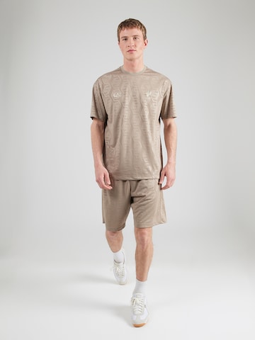 EA7 Emporio Armani Тренировочный костюм в Бежевый: спереди