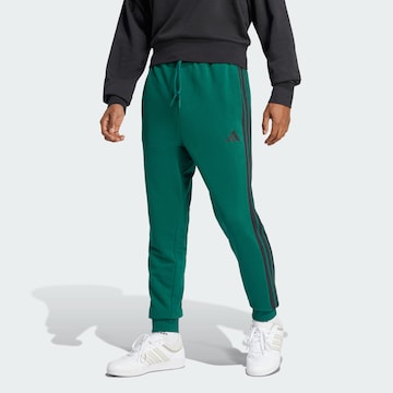 Tapered Pantaloni sportivi 'Essential' di ADIDAS SPORTSWEAR in verde: frontale