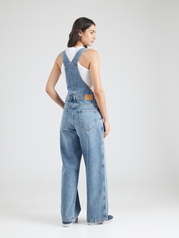 Loosefit Jeans con pettorina di Monki in blu