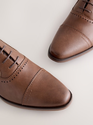 Next Veterschoen in Bruin