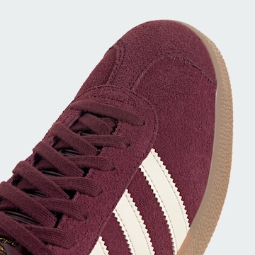 Baskets basses 'Gazelle' ADIDAS ORIGINALS en rouge