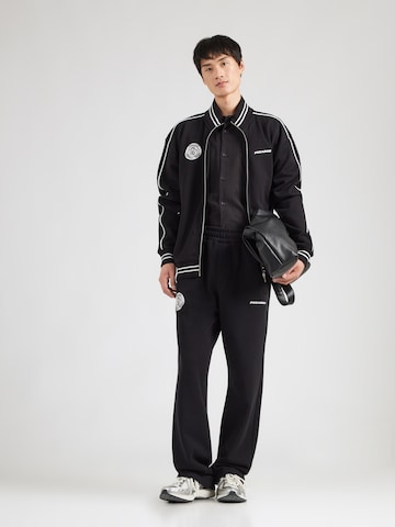 Regular Pantalon Pegador en noir