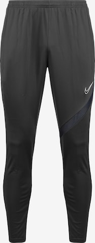 Coupe slim Pantalon de sport 'Academy Pro' NIKE en gris : devant