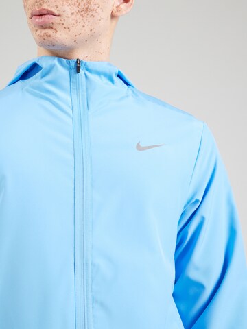 NIKE Спортивная куртка 'FORM' в Синий