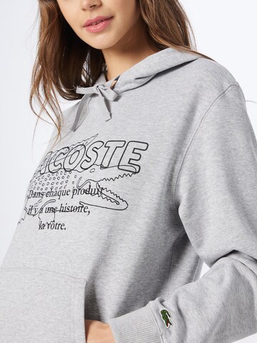 LACOSTE Tréning póló - szürke