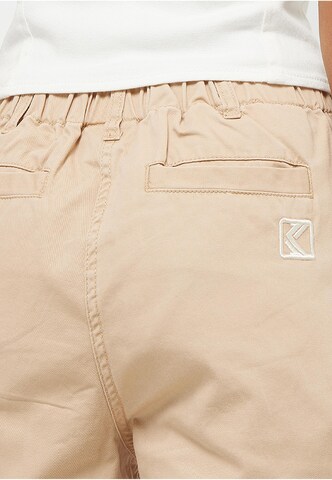 Karl Kani Wide Leg Cargohose in Beige